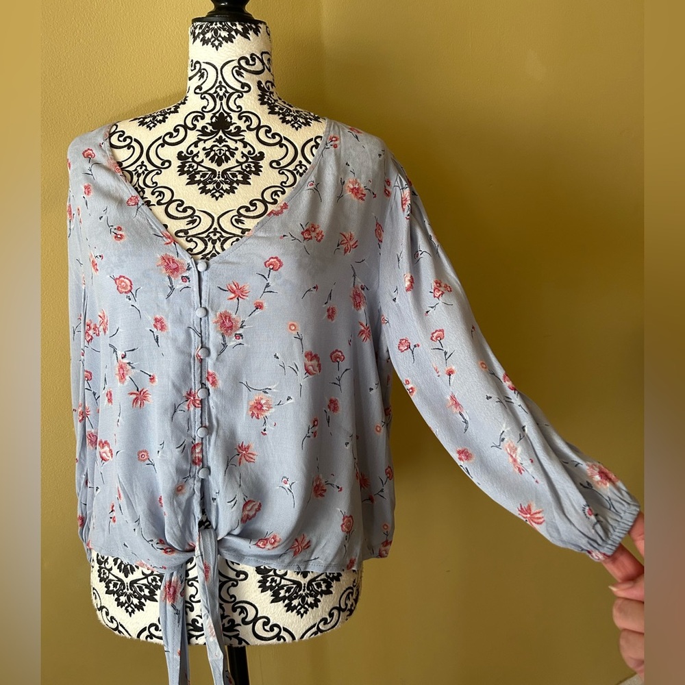 Blue top with roses